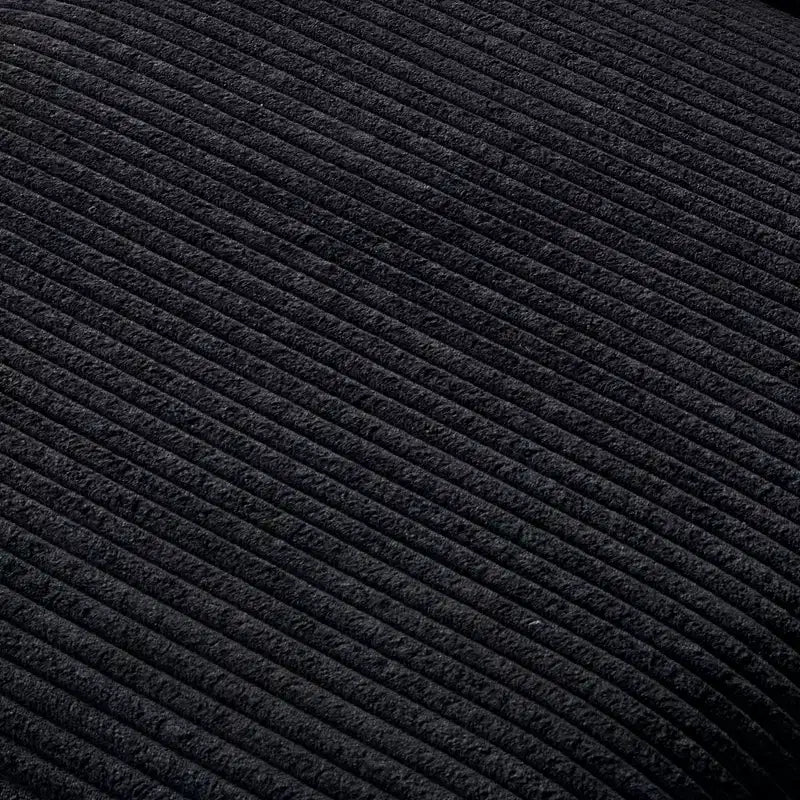 Poltrona imbottita GDFStudio Warner in velluto a coste 32W con pouf