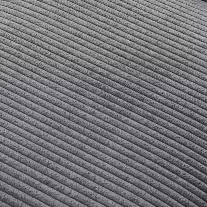 Poltrona imbottita GDFStudio Warner in velluto a coste 32W con pouf