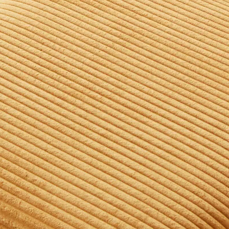 Poltrona imbottita GDFStudio Warner in velluto a coste 32W con pouf