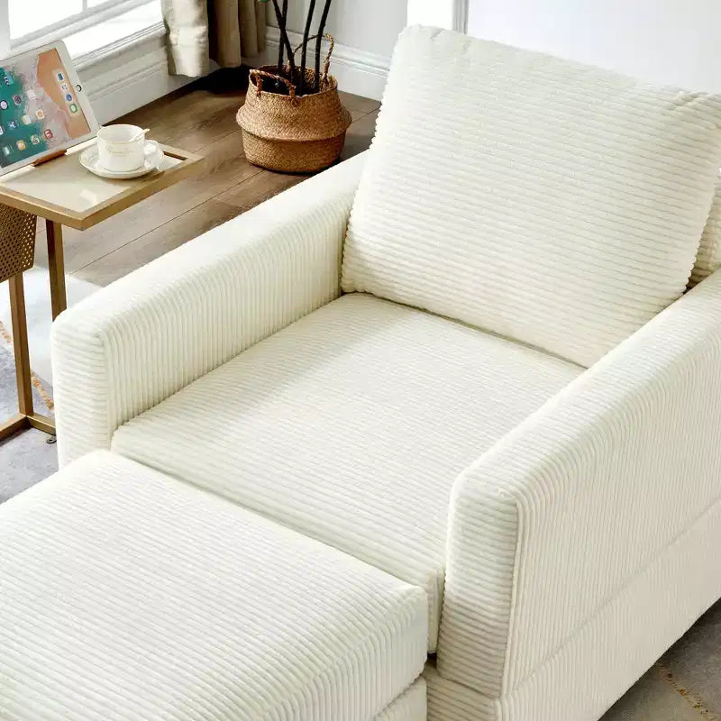 Poltrona imbottita GDFStudio Warner in velluto a coste 32W con pouf