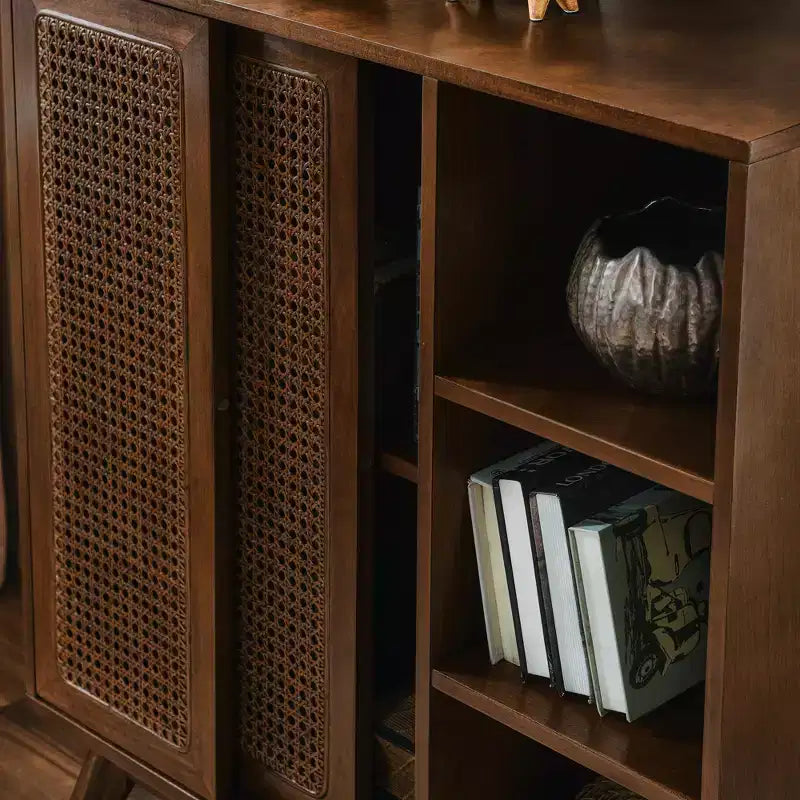 Medieval-inspired modern rattan sideboard with adjustable shelves and solid wood base, ideal for entryways or kitchens. Available in dark wood