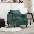 Poltrona moderna color smeraldo rivestita in ciniglia da 29.53, con struttura in legno massello e cuscini