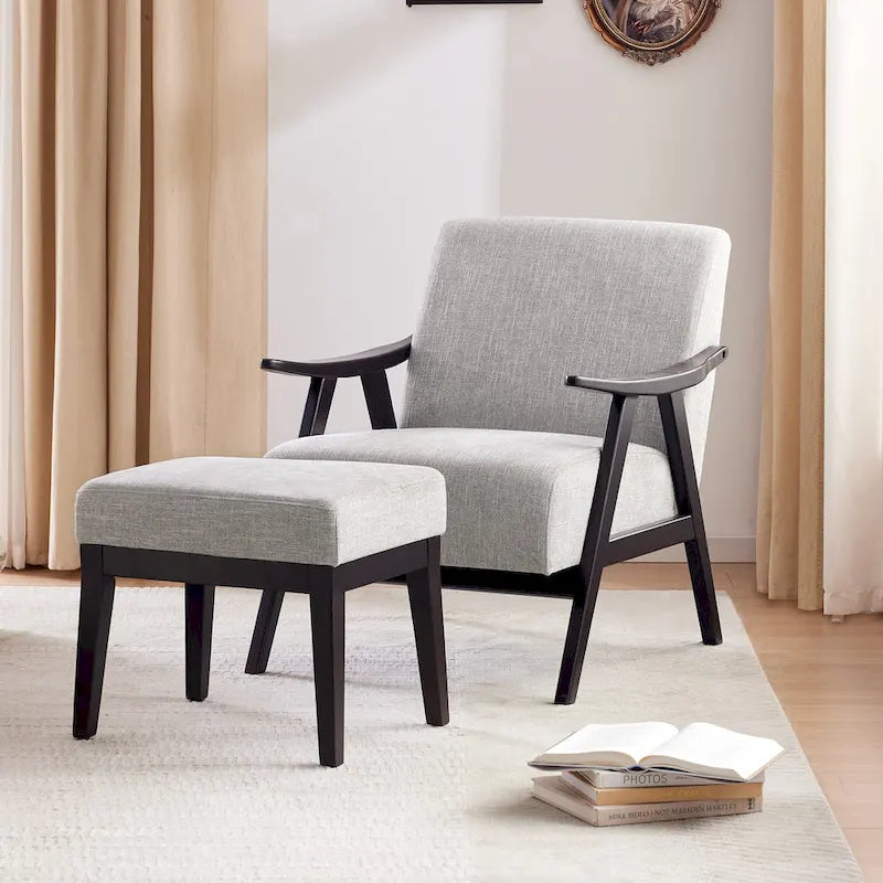 Poltrona imbottita Mid Century da 27.7 con struttura in legno massello e pouf