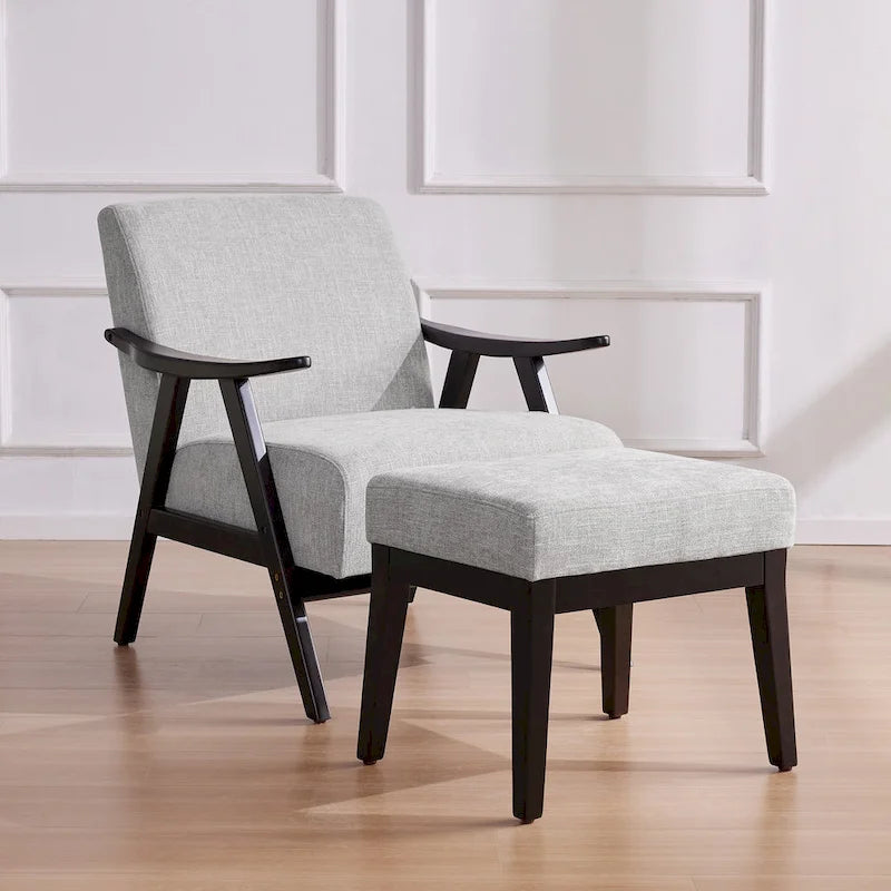 Poltrona imbottita Mid Century da 27.7 con struttura in legno massello e pouf