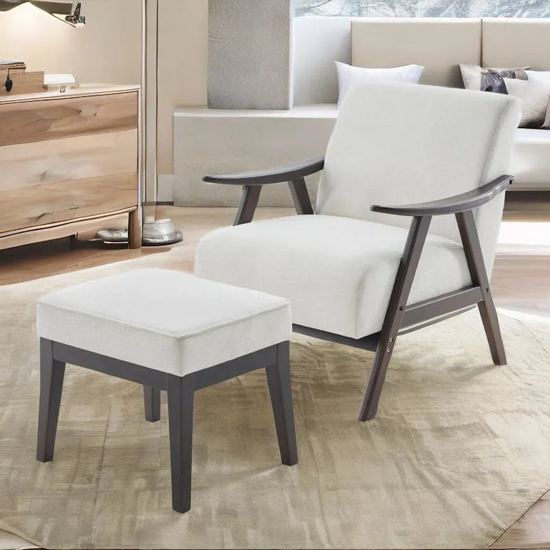 Poltrona imbottita Mid Century da 27.7 con struttura in legno massello e pouf