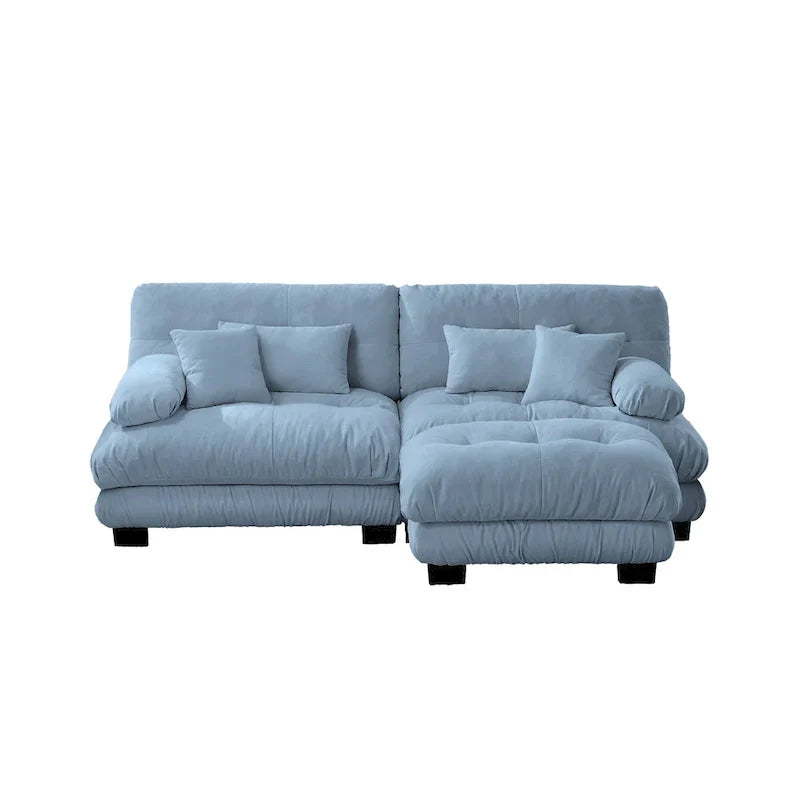 Divano sezionale a L in ciniglia con cuscini lombari