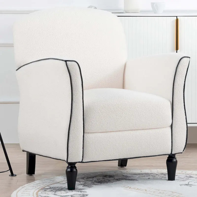 Poltrona d'accento imbottita con gambe in legno