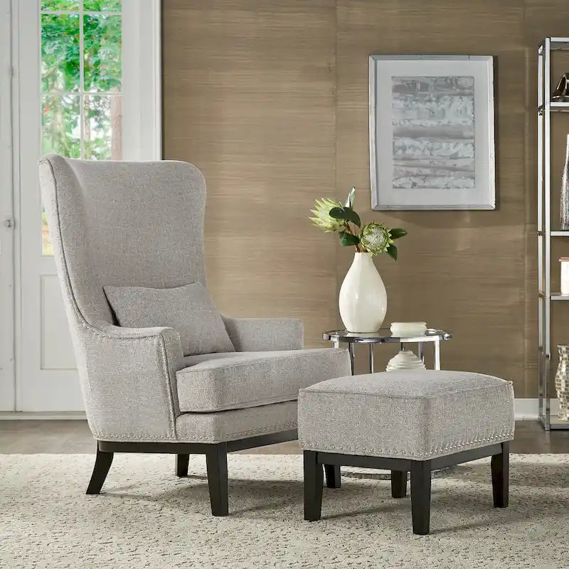 Poltrona lounge Capella Highback Wing con poggiapiedi di iNSPIRE Q Artisan