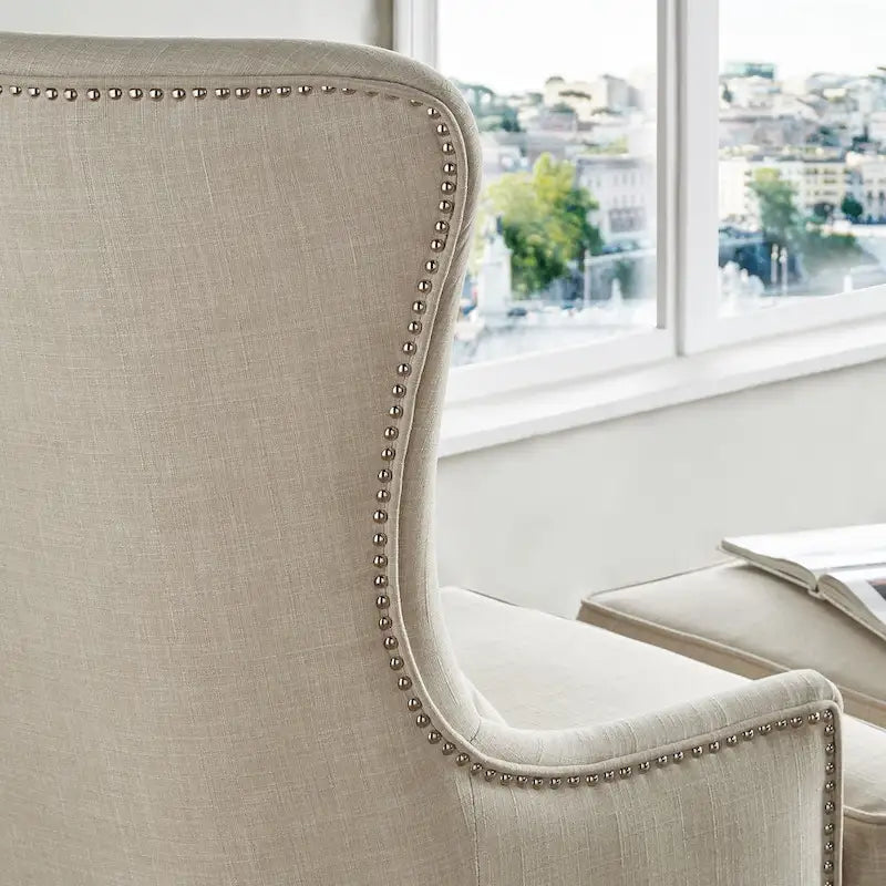 Poltrona lounge Capella Highback Wing con poggiapiedi di iNSPIRE Q Artisan