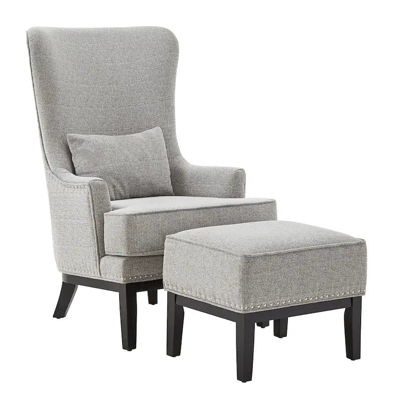 Poltrona lounge Capella Highback Wing con poggiapiedi di iNSPIRE Q Artisan