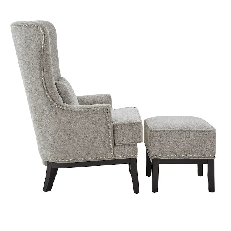 Poltrona lounge Capella Highback Wing con poggiapiedi di iNSPIRE Q Artisan