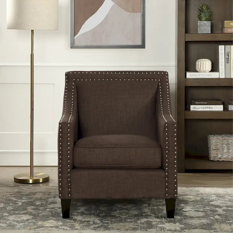 Poltrona d'accento Erica con borchie decorative cromate