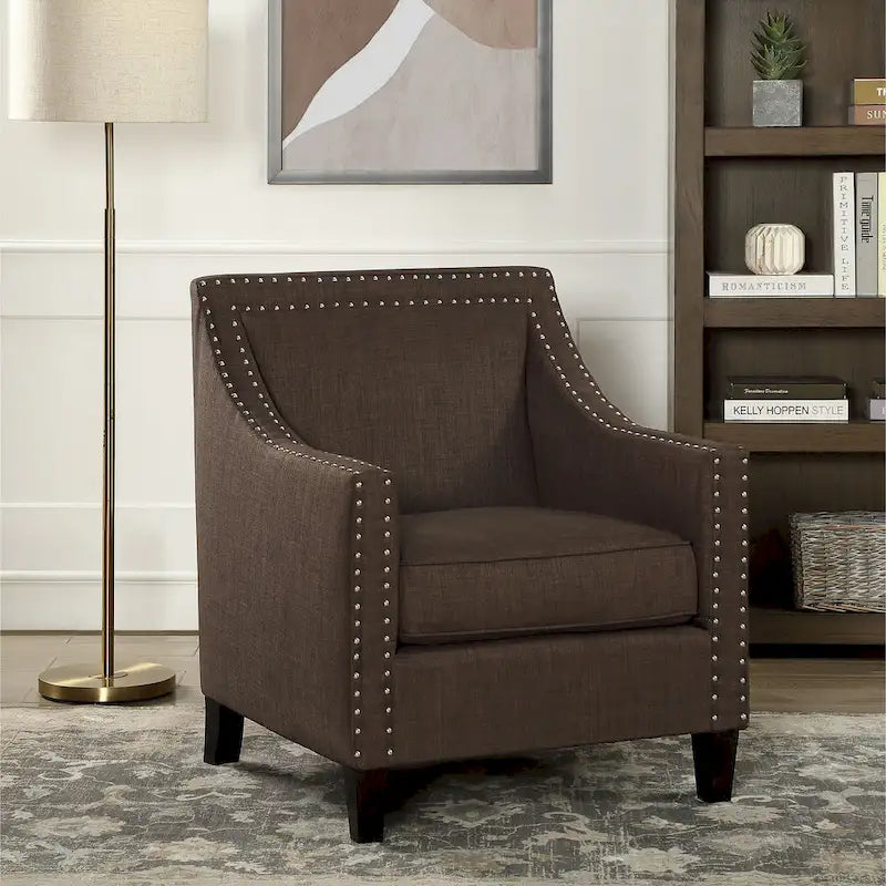 Poltrona d'accento Erica con borchie decorative cromate