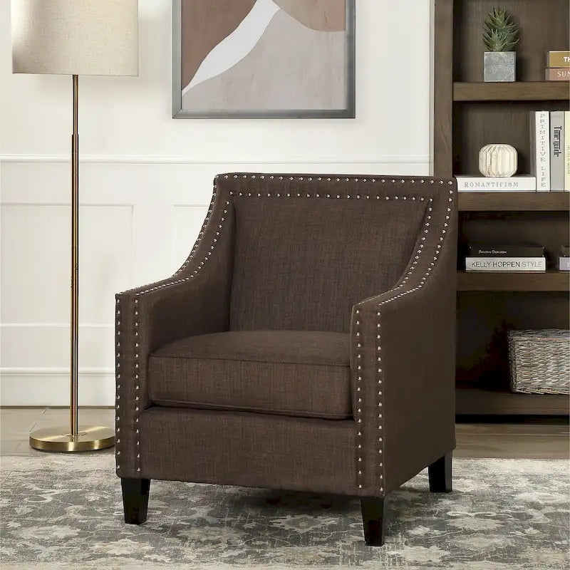 Poltrona d'accento Erica con borchie decorative cromate