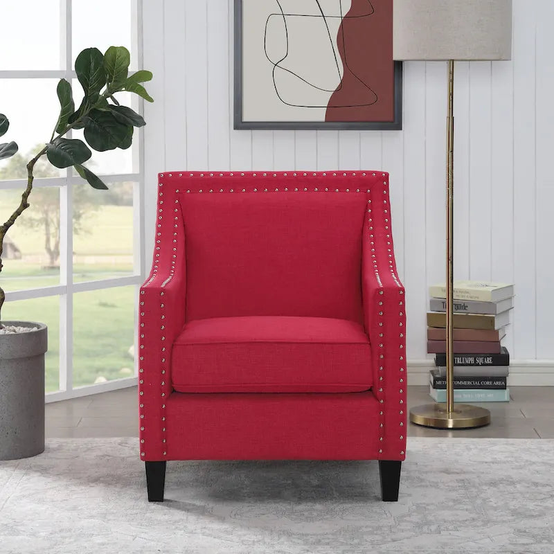 Poltrona d'accento Erica con borchie decorative cromate