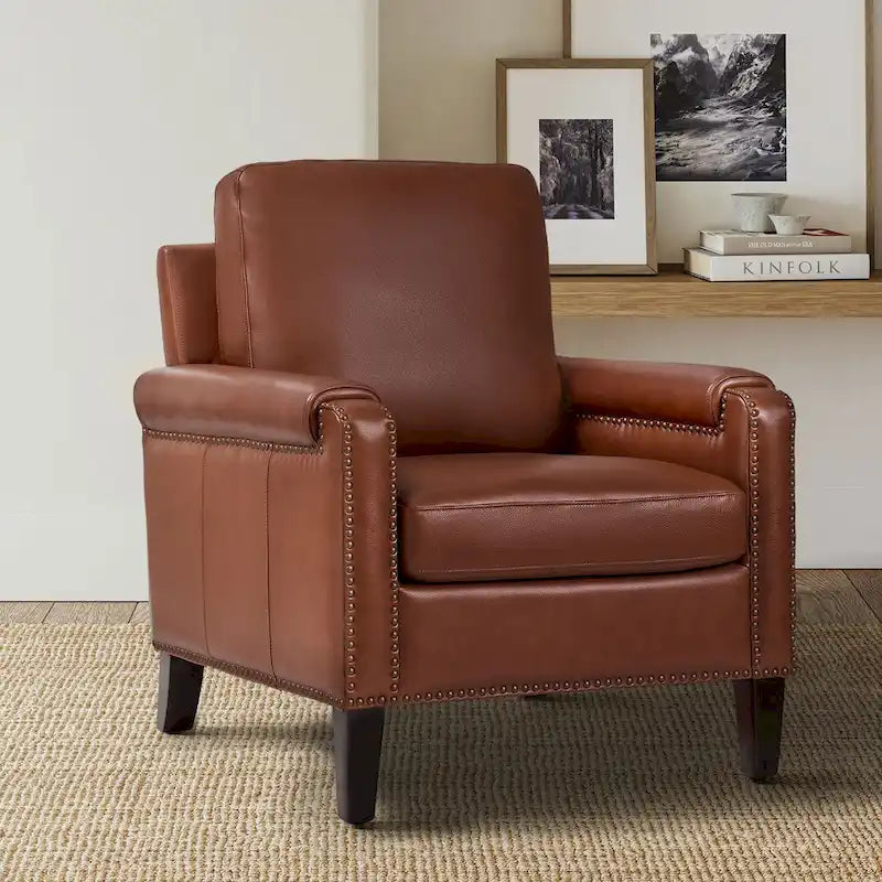 Poltrona Kunz Transitional in vera pelle con cuscino sfoderabile e profili con borchie di HULALA HOME